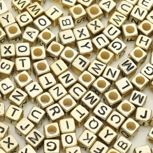 Golden acrylic cube alphabet beads with black engraved letters A-Z for DIY jewelry making