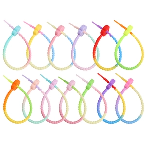 Detailed macro view of flexible silicone bead cable ties in 13 gradient macaron colors