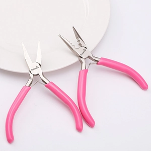 Close-up of pink non-slip handle jewelry pliers set for DIY handmade beading work