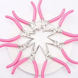 Set of eight pink jewelry pliers for DIY beading and craft tasks on white background