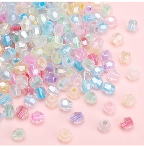 Macro shot of iridescent faceted glass beads with AB coating for DIY jewelry making