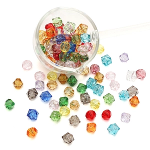 Macro view of colorful faceted bicone acrylic beads for DIY jewelry and bracelet making