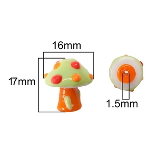 Detail view of 17mm green hand-painted mushroom glass bead with 1.5mm hole for DIY jewelry