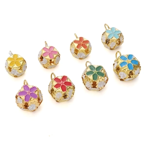 Detail of 8 colorful hollow floral bell pendants for DIY jewelry and accessories making