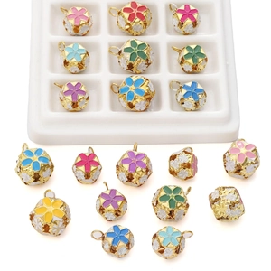 Detailed macro view of colorful hollow cloisonné flower beads for DIY jewelry making