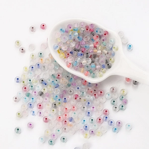 Macro shot of colorful translucent glass abacus beads for handmade DIY jewelry