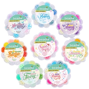 DIY jewelry kit collection showing 8 floral-themed acrylic bead boxes in various colors