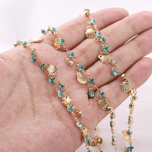 Exotic gold shell chain with turquoise rhinestones for DIY jewelry and accessories