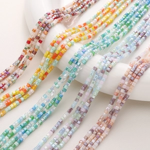 Macro shot of colorful 2mm faceted crystal square beads for DIY jewelry making