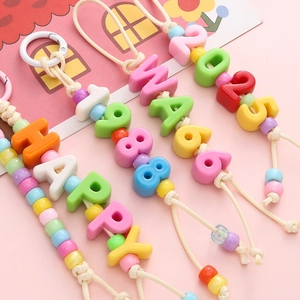 DIY colorful acrylic alphabet and number bead keychains with macaron round spacers