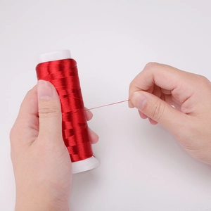 Polyester velvet cord for DIY jewelry making, bright red roll on a white plastic spool