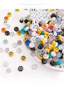 Detailed view of colorful 10mm acrylic smiley face beads for DIY jewelry making