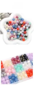 Close-up of colorful 11x8mm iridescent resin beads for DIY handmade jewelry crafts