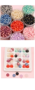 Detail view of colorful 11x8mm cat-eye resin beads sorted for DIY jewelry making