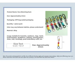 Detailed view of colorful alloy smiley block keychain with size labels and dimensions