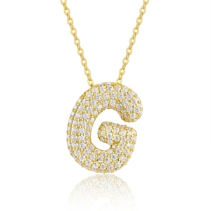 Detailed view of 18K gold plated silver letter G necklace with pavé moissanite stones