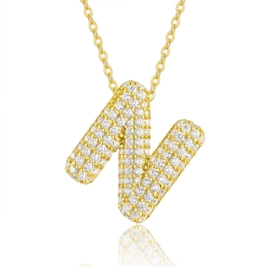 Detail shot of capital letter N pendant with pavé set moissanite on gold O-chain necklace