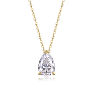 Macro view of pear-cut moissanite pendant with gold 3-prong setting and fine chain