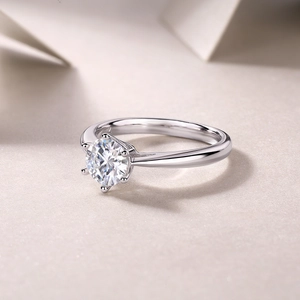Close-up of classic six-prong S925 silver ring with a round brilliant cut lab diamond