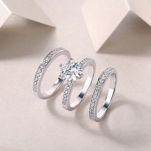 Detailed view of the 925 silver moissanite three-piece ring set with six-prong setting