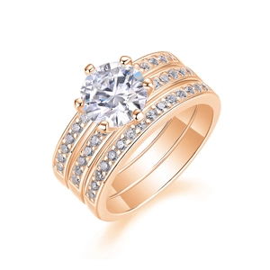 Macro shot of rose gold S925 sterling silver three-piece ring set with moissanite