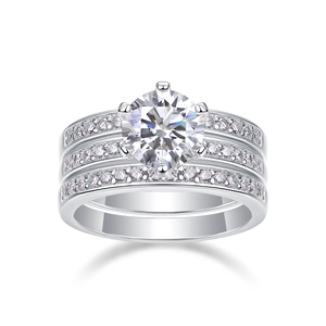 Detailed macro view of S925 sterling silver three-piece moissanite ring set with 6-prong setting