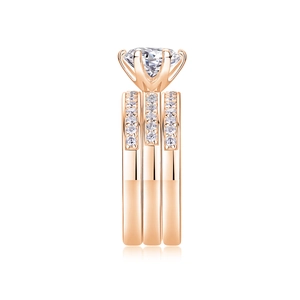 Detail of rose gold S925 silver stacked rings with moissanite in crown six-prong setting