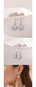 Makro-Details der silbernen S925-Ohrhänger mit Sonnenblumen-Labor-Diamant-Design