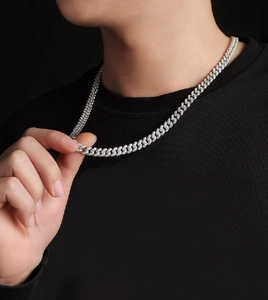 Close-up of S925 sterling silver Cuban link chain necklace set with Moissanite stones