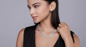 Close-up of hip hop Cuban link necklace and matching stud earrings with pave setting