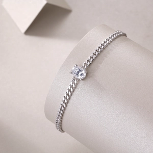 S925 Sterling silver cuban link bracelet with oval moissanite in four-prong setting