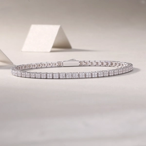 Macro detail of S925 sterling silver moissanite tennis bracelet with secure plug-in clasp
