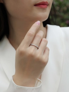 Close-up of elegant S925 sterling silver eternity ring with sparkling moissanite stones