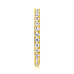 Detailed view of the gold eternity ring featuring a precision-set round moissanite band