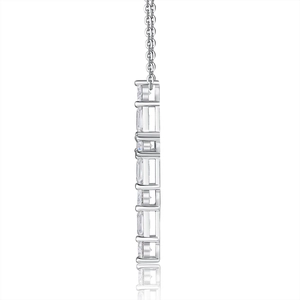 Detail view of a sparkling 925 sterling silver cross pendant with moissanite stones