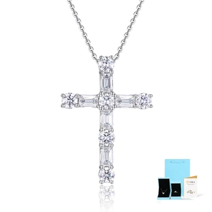 Detailed view of moissanite cross pendant with GRA certificate and gift packaging