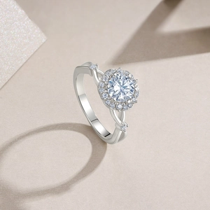 Detailed side view of 925 silver halo ring with round cut moissanite and lace pavé setting