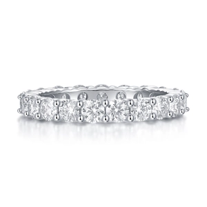 Macro detail of S925 sterling silver eternity ring with prong-set moissanite stones