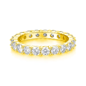 Macro shot of gold plated S925 silver eternity ring with round cut moissanite stones