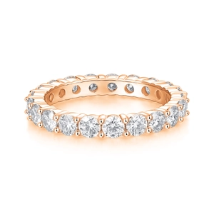 Macro view of S925 sterling silver eternity ring in rose gold with moissanite pavé stones