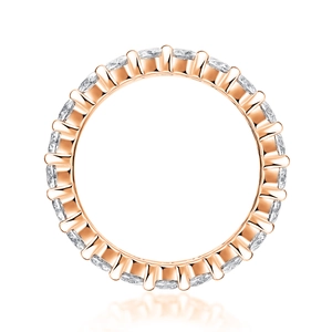 Detail of rose gold moissanite eternity ring with pave-set round brilliant gemstones