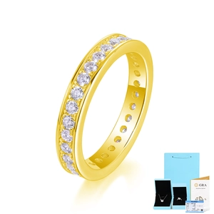 Detailed view of gold moissanite eternity ring with GRA certificate and gift box