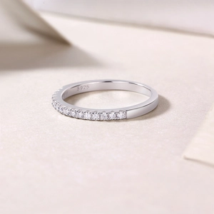 Detailed close-up showing the S925 sterling silver hallmark and pavé-set cubic zirconia on the band