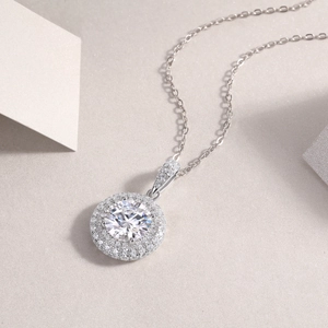 Elegant S925 sterling silver halo necklace with a round moissanite pendant and fine chain