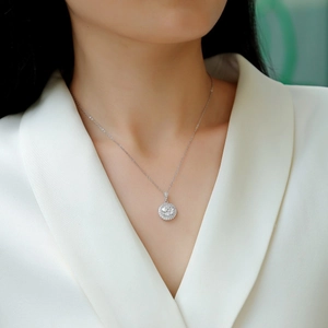 Elegant S925 sterling silver moissanite necklace with halo pendant on female model