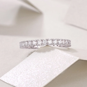 Macro shot of S925 sterling silver eternity ring with sparkling moissanite pavé setting