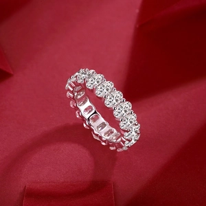 Luxurious S925 sterling silver eternity ring featuring oval cut moissanite stones