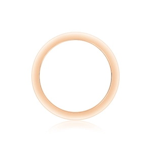 Vue macro détaillée de la finition polie en or rose et du profil circulaire de la bague