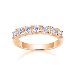 Detail of rose gold plated ring with seven round-cut sparkling moissanite stones