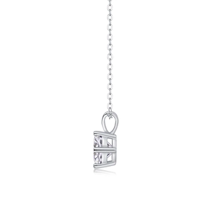 Side view of 925 sterling silver four-prong round moissanite pendant necklace
